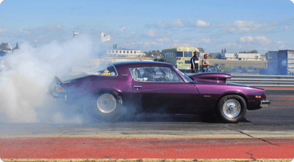 Purple classic car on raceway