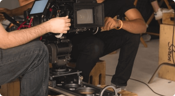 Two camera operators using film camera