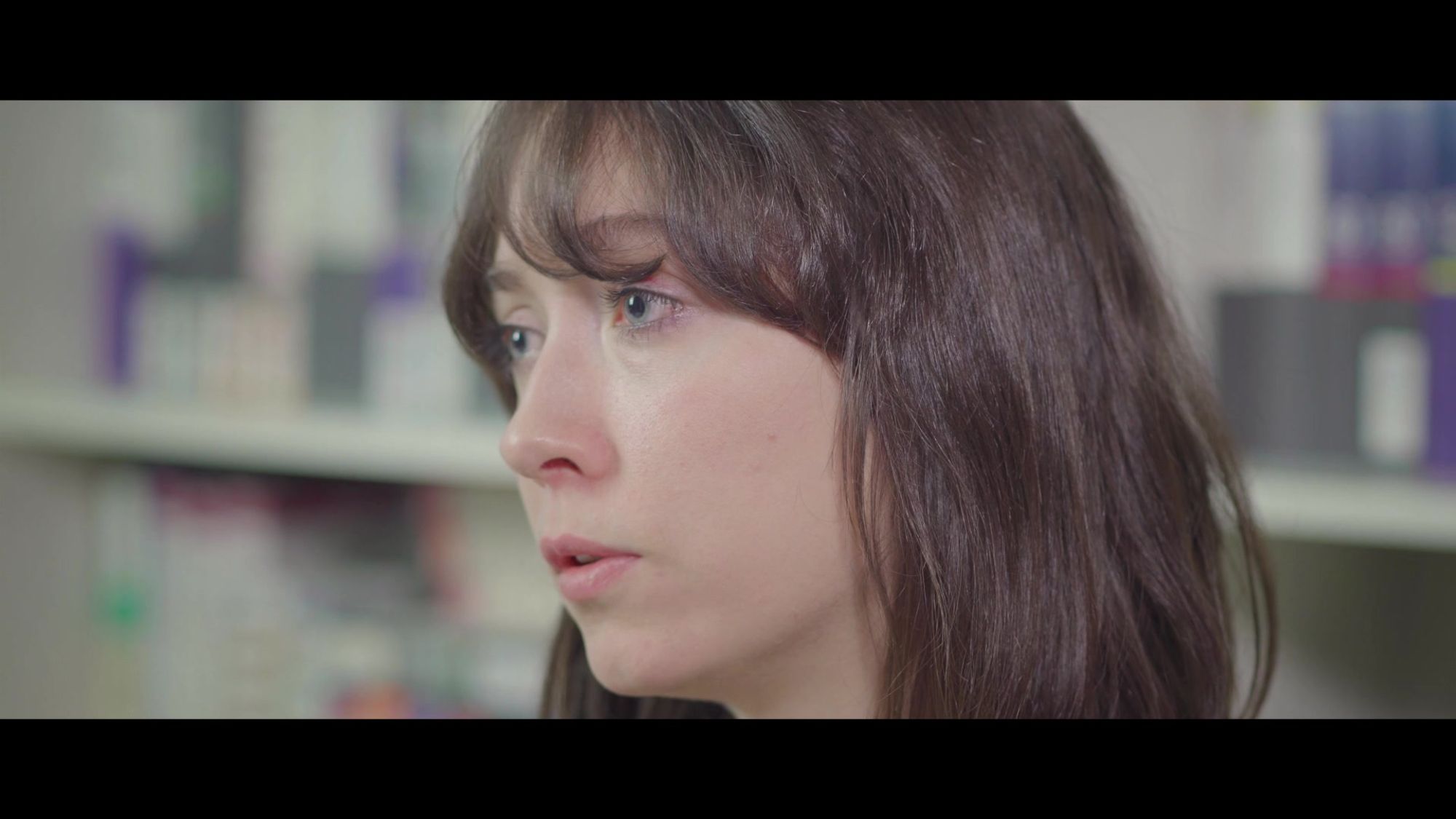 Close up of brunette woman in three-quarter view